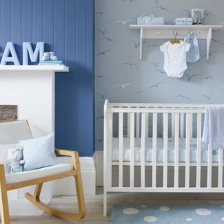 Blue nursery with light blue seagull wallpaper