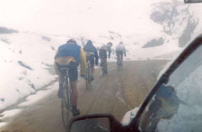 The view from a team car as riders fight the snow and ice