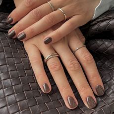 Trendy earthy brown nail color that will replaced &ldquo;dated&rdquo; nail polish shades in 2026.