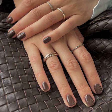 Trendy earthy brown nail color that will replaced &ldquo;dated&rdquo; nail polish shades in 2026.