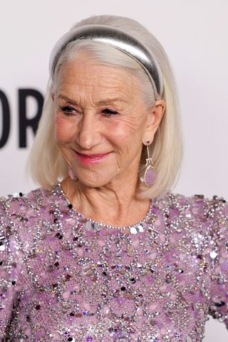 Helen Mirren is pictured wearing a silver hairband at the 19th Annual L'Oréal Paris Women Of Worth Celebration at NeueHouse Hollywood on November 21, 2024 in Hollywood, California.