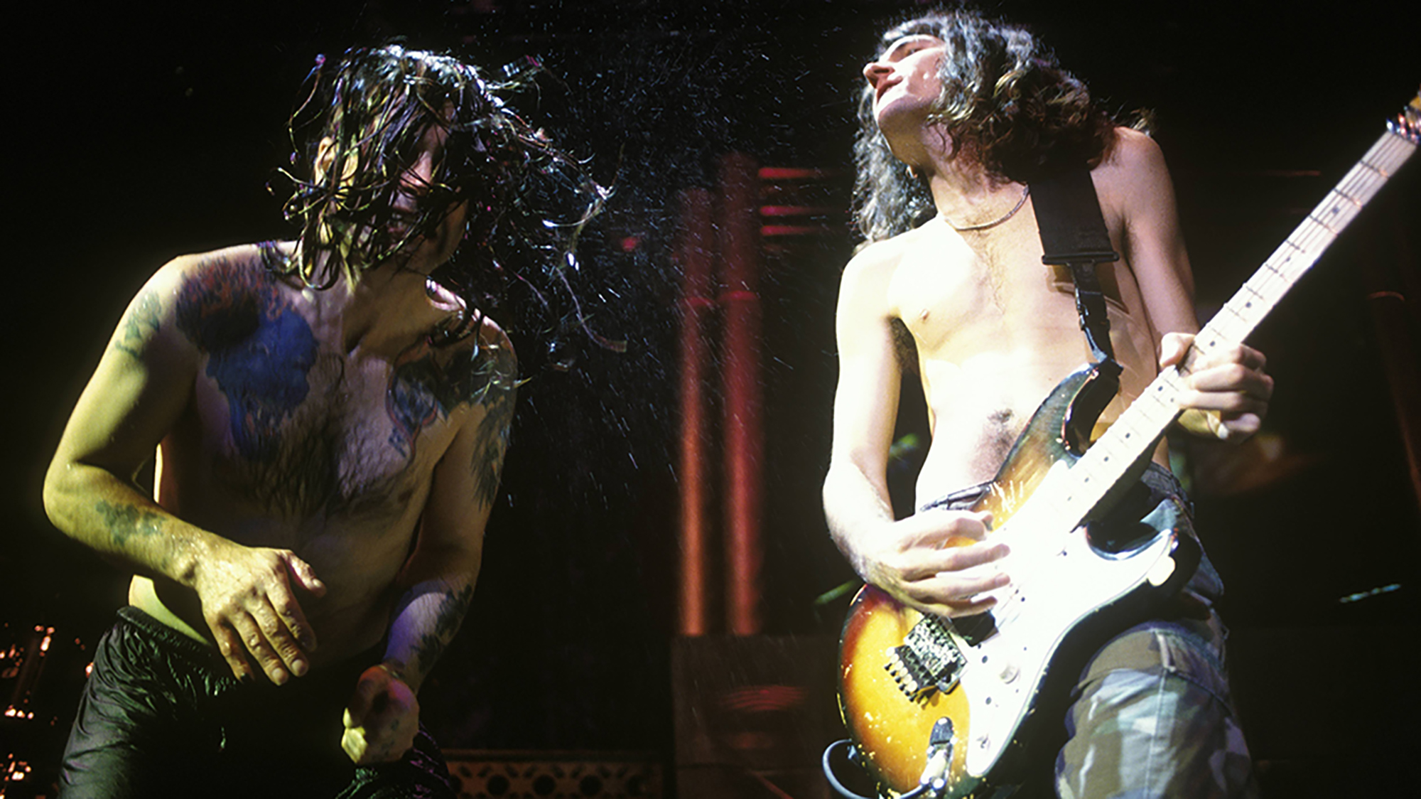 Joe HOLMES and Ozzy OSBOURNE; Ozzy Osbourne and Joe Holmes performing live onstage 