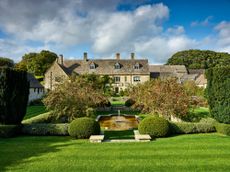 The formal pool is circled by Malus ‘Evereste’, which gives year-round interest. Garden by Graham Lloyd-Brunt; photography ©Jason Ingram