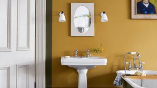 Annie Sloan ochre paint used in a bathroom to illustrate paint color ideas for bathrooms