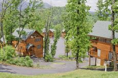 Smoky Mountain Log Cabins line up for a view of the mountains.