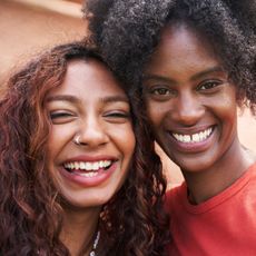 a picture of two women smiling - vegan skincare brands