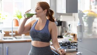 woman drinking a healthy shake