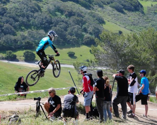 A Yeti racer flies over the crowd