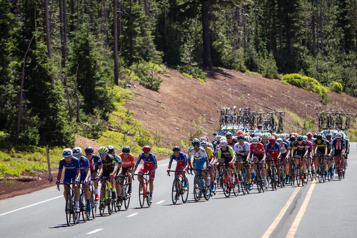 The main bunch hits the long climb