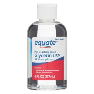 A clear plastic bottle of glycerin with a white, red and blue label and white cap