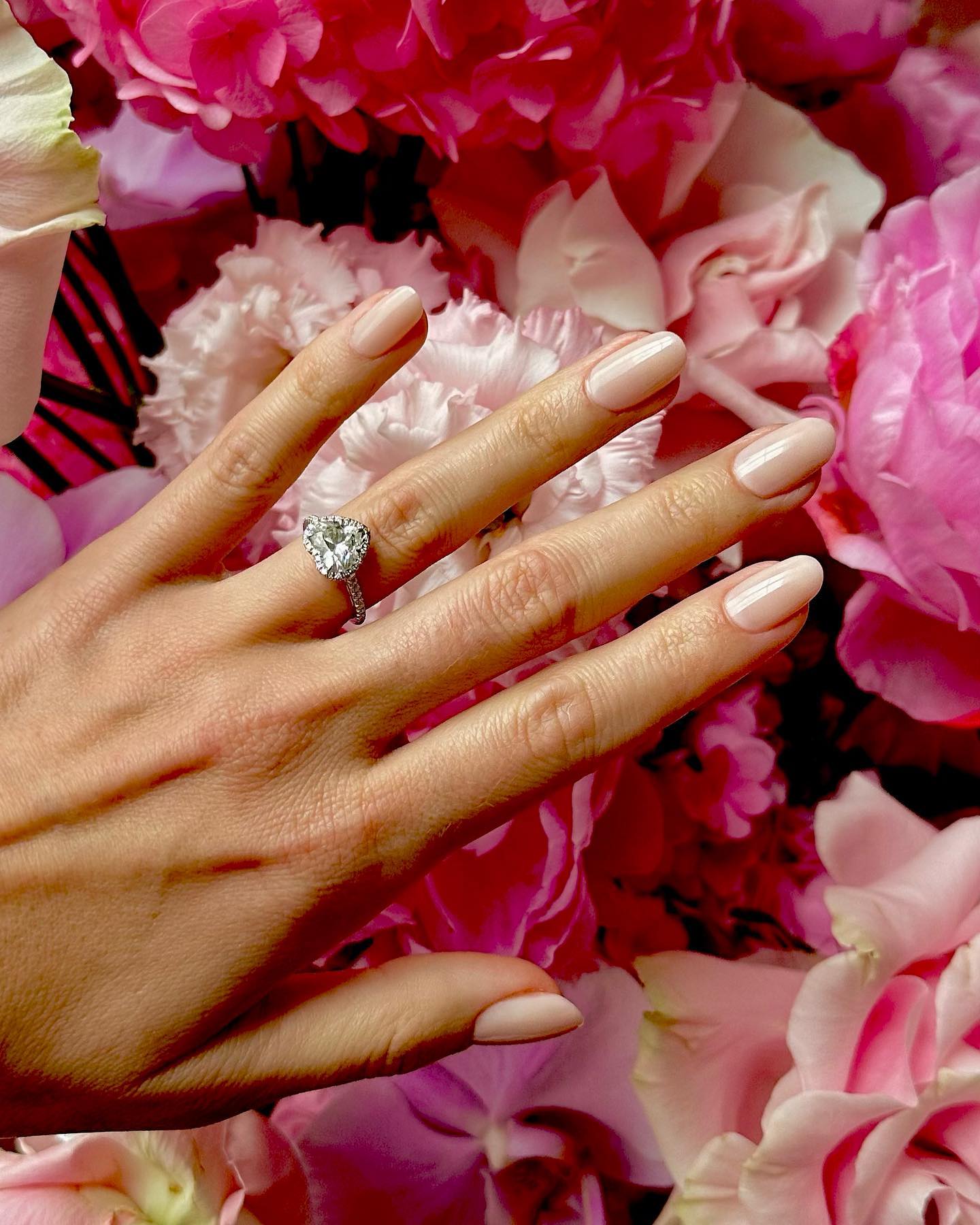 Margot Robbie's manicure with sheer pink polish