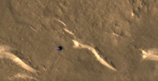 The HiRISE camera aboard NASA's Mars Reconnaissance Orbiter captured this image of China's Zhurong rover on the Martian surface on March 11, 2022.