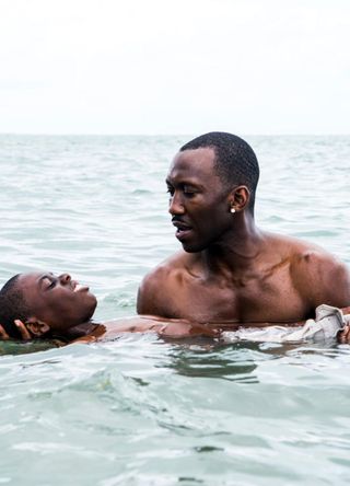 Mahershala Ali and Alex R. Hibbert in Moonlight.