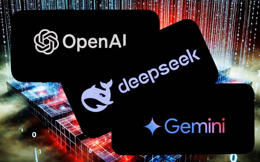 The logos of OpenAI, DeepSeek and Google Gemini artificial intelligence apps on mobile phones, arranged in Riga, Latvia, on Wednesday, Jan. 29, 2025. Microsoft Corp.&nbsp;and OpenAI are investigating whether data output from OpenAI&rsquo;s technology was obtained in an unauthorized manner by a group linked to Chinese artificial intelligence startup DeepSeek, according to people familiar with the matter. Photographer: Andrey Rudakov/Bloomberg