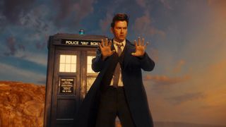 David Tennant stands in front of the TARDIS in The Power of the Doctor.