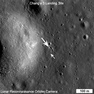 China's Chang'e 3 moon rover (large arrow) and rover (small arrow) are shown in this view from the LROC NAC instrument of NASA's Lunar Reconnaissance Orbiter just before lunar sunset on their first