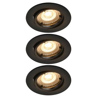 A row of black spotlights on a white background