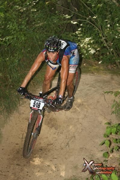 Kim Eppen (Mercy-Specialized) of Iowa City, Iowa powered away and was riding well into the Elite men's field before crossing the line over three minutes ahead of second place. Photo by Extreme Photography.
