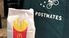 A bag of food from McDonald's ordered through the Postmates © Chandice Choi/AP/Shutterstock