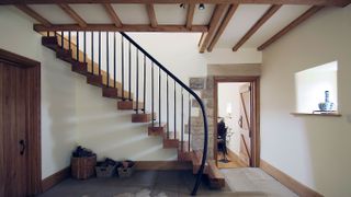 contemporary feeling staircase in hallway from bisca