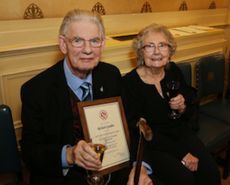 Richard Godden and his wife Sheila with an SMS award