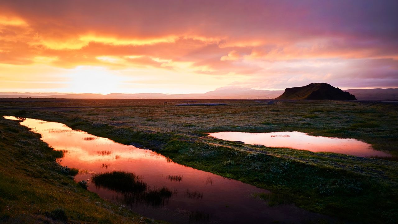 sunset over Icelandic waterways