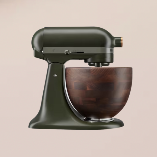 A green kitchenaid mixer with a wooden bowl