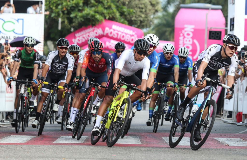 Colombian cyclist Nairo Quintana C all white competes during the Ruta de Colombia championship in Bucaramanga Colombia on February 5 2023 Photo by Jaime MORENO VARGAS AFP Photo by JAIME MORENO VARGASAFP via Getty Images