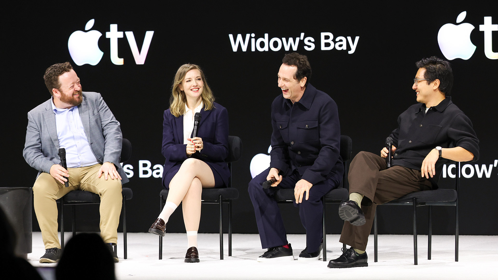Katie Dippold, Matthew Rhys and Hiro Murai sit on a panel for Widow's Bay at Apple TV's 2026 press event