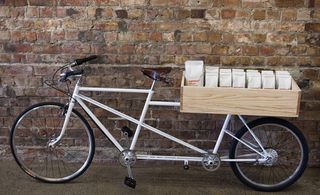 Coffee packet packed in cycle with side brick wall