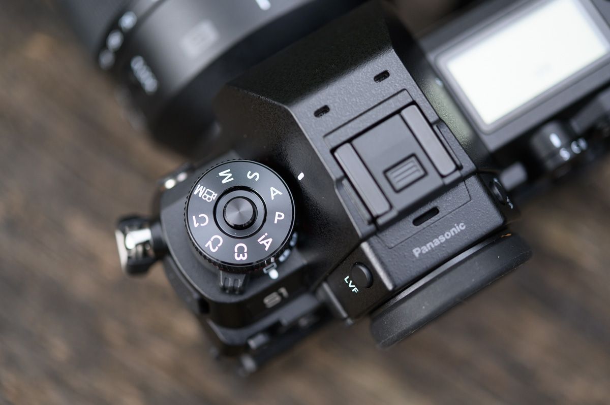The mode dial has a locking button in its centre, and this needs to be pressed down for the dial to turn.