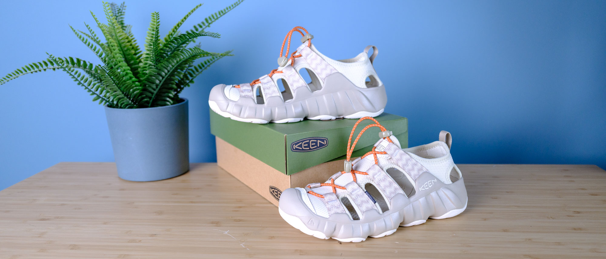 the Keen Hyperport H2 water hiking sandals with AquaGrip soles, injected foam soles, and a cinch clasp for slip-on ease, in the taupe/coral colorway