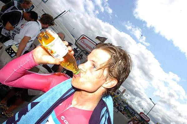 Linus Gerdemann chugs some juice after the TT