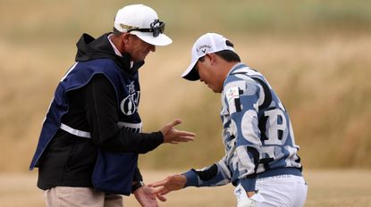 Si Woo Kim's Caddie