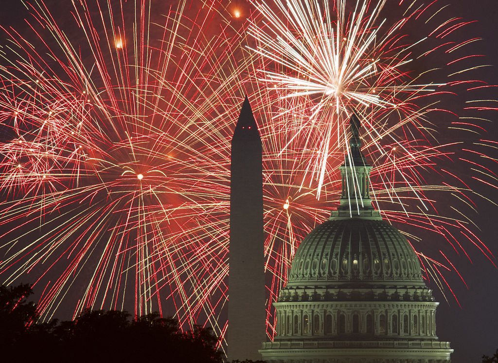 Fireworks explode over the National Mall as the US Capitol (R) and National Monument are seen on July 4, 2017, in Washington, DC.