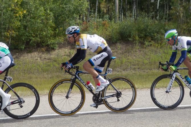 Tom Dumoulin (Giant-Shimano) rides back in the bunch with the leaders jersey