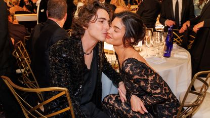 Kylie Jenner in a sheer lace gown with Timothee Chalamet