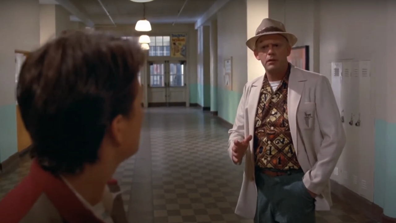 Christopher Lloyd questions something Michael J. Fox said in Back To The Future.