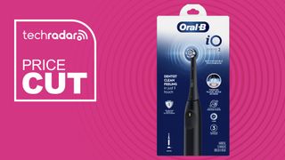 Oral-B iO Series 2 Simple Clean Electric Toothbrush box on pink background with TechRadar price cut sign