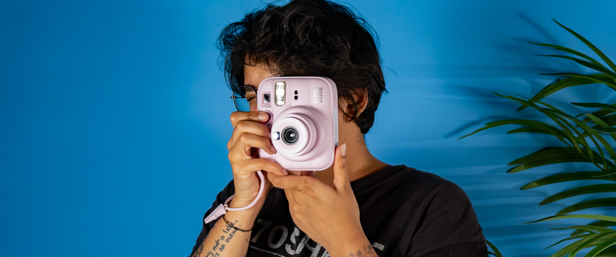 A Candy Pink Fujifilm Instax mini 13 instant camera
