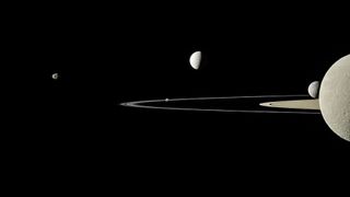 Five of Saturn's moons from left to right are Janus, Pandora, Enceladus, Mimas and Rhea. Saturn is on the right.