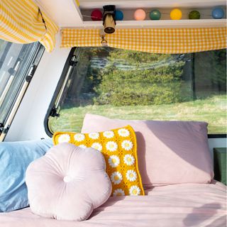 Caravan makeover with bed area and cushions