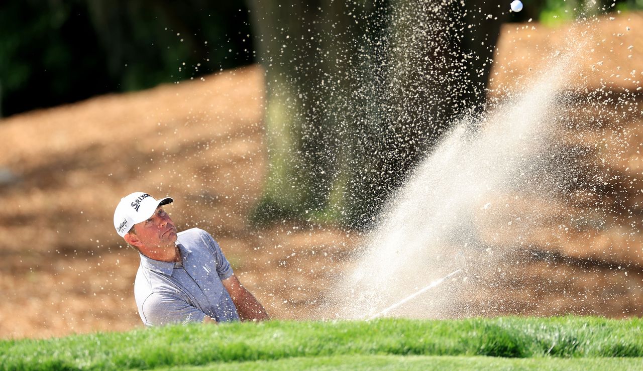 Lucas Glover hits a bunker shot