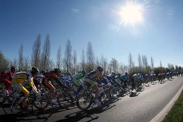The peloton enjoys the sun in northern Italy.