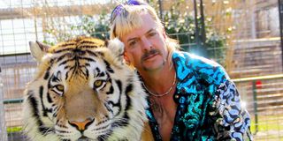 Joe Exotic posing with a tiger The Masked Singer