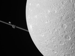 NASA's Cassini spacecraft obtained this unprocessed image on Dec. 12, 2011. The camera was pointing toward Saturn's moon Dione from approximately 69,989 miles (112,636 kilometers) away.