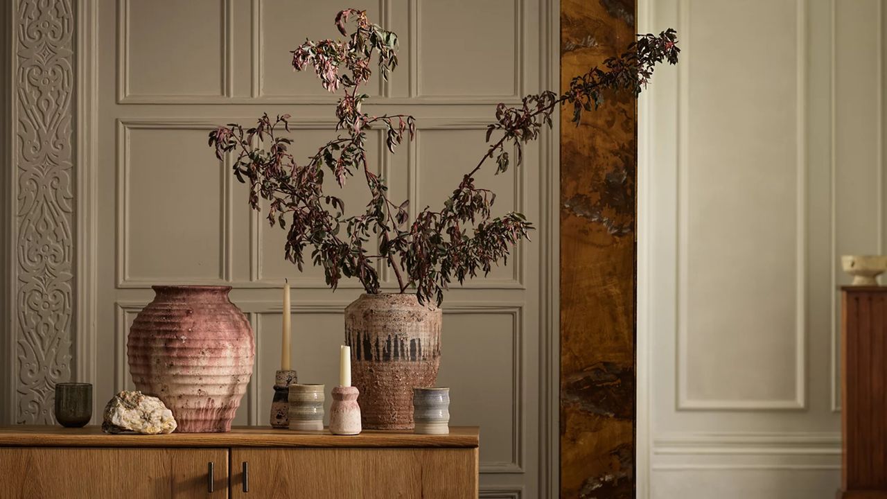 Large textured vase on side console table