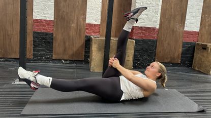 Woman exercising in a gym