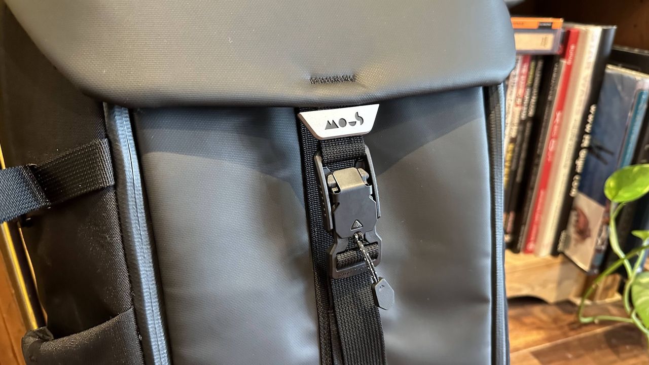 Mous Extreme Commuter backpack on a wooden floor in a living room