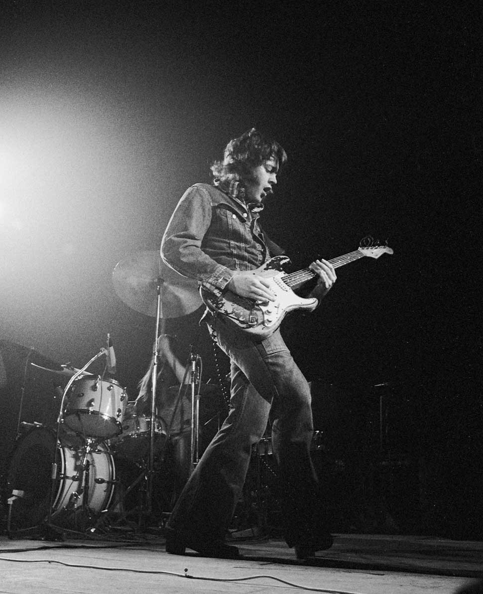 Rory Gallagher onstage in 1974